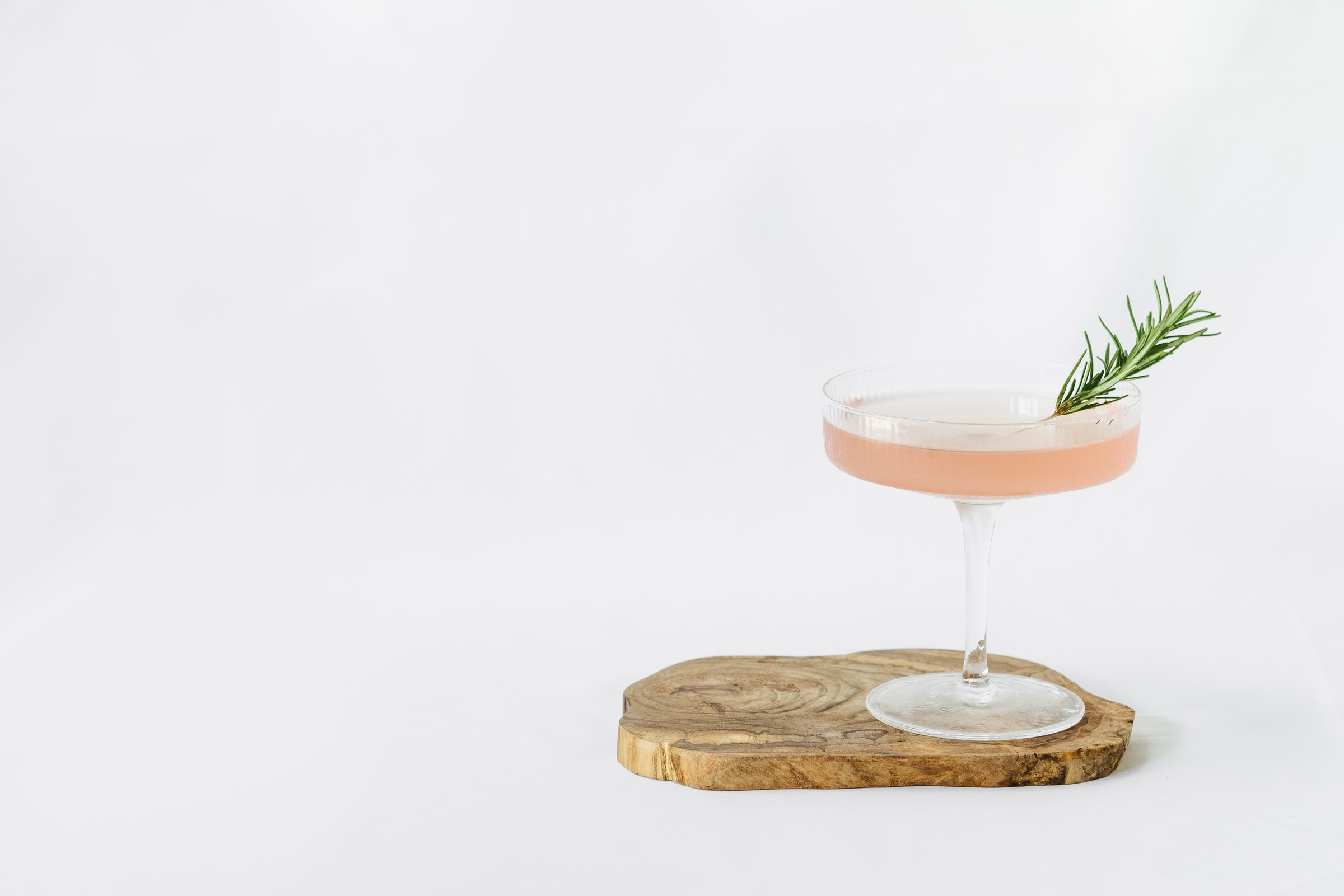 Pink Cocktail with Rosemary  Close-up